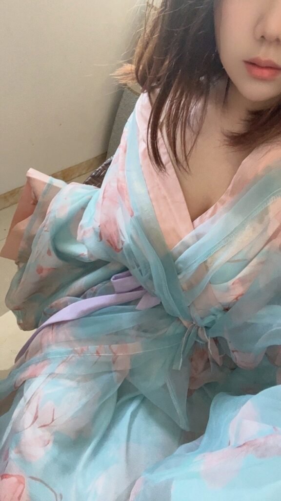 Young lady wearing Jiao Jiao restored Wei-Jin Dynasty wide sleeve straight robe hanfu 3-piece set, outdoor ancient architecture photoshoot
