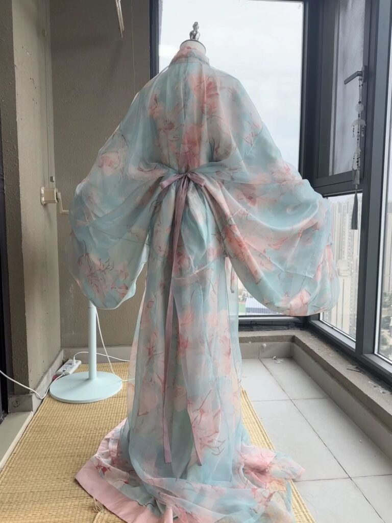 Young lady wearing Jiao Jiao restored Wei-Jin Dynasty wide sleeve straight robe hanfu 3-piece set, outdoor ancient architecture photoshoot