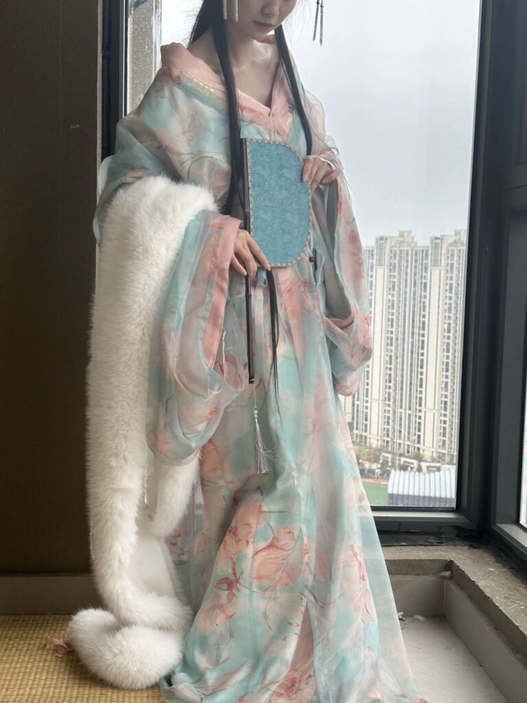 Young lady wearing Jiao Jiao restored Wei-Jin Dynasty wide sleeve straight robe hanfu 3-piece set, outdoor ancient architecture photoshoot